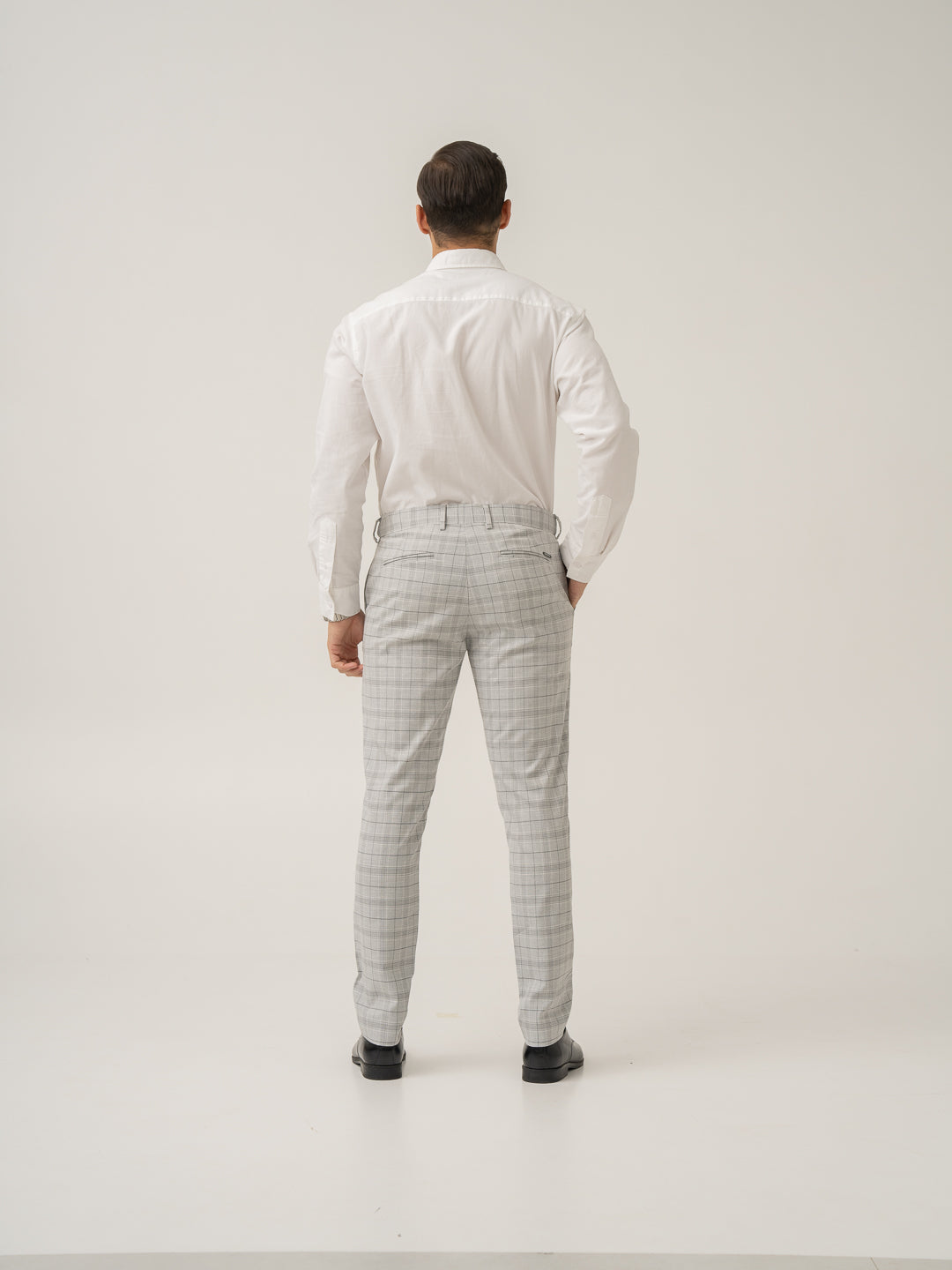 Full length back view of native grey checks formal pant at Pant Project