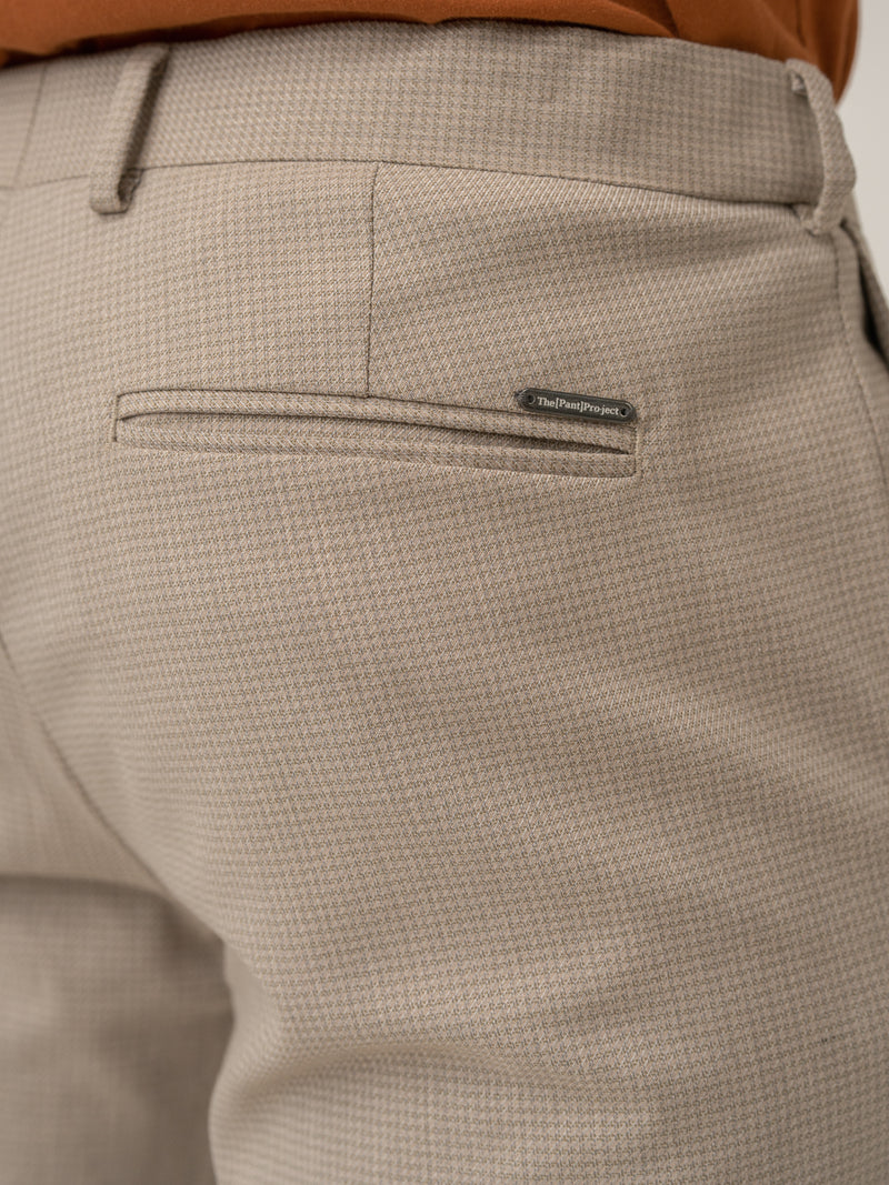 Back pocket detail of cork beige textured formal pant at Pant Project