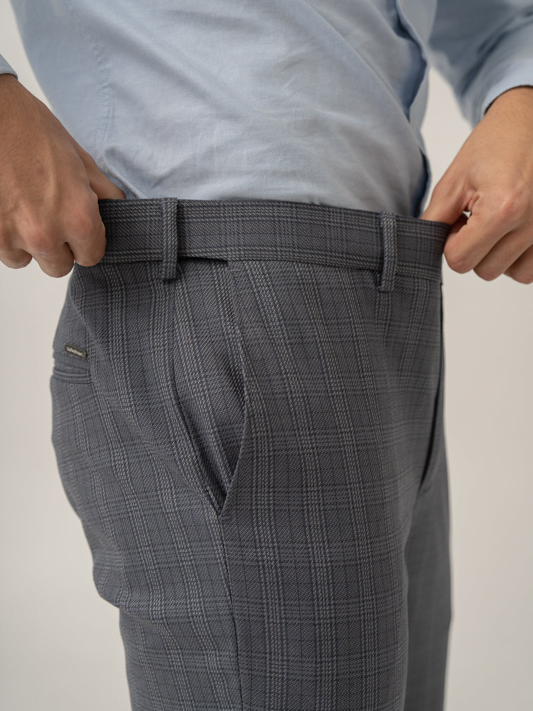 Stretch waistband close up of whisper grey checks formal pant at Pant Project