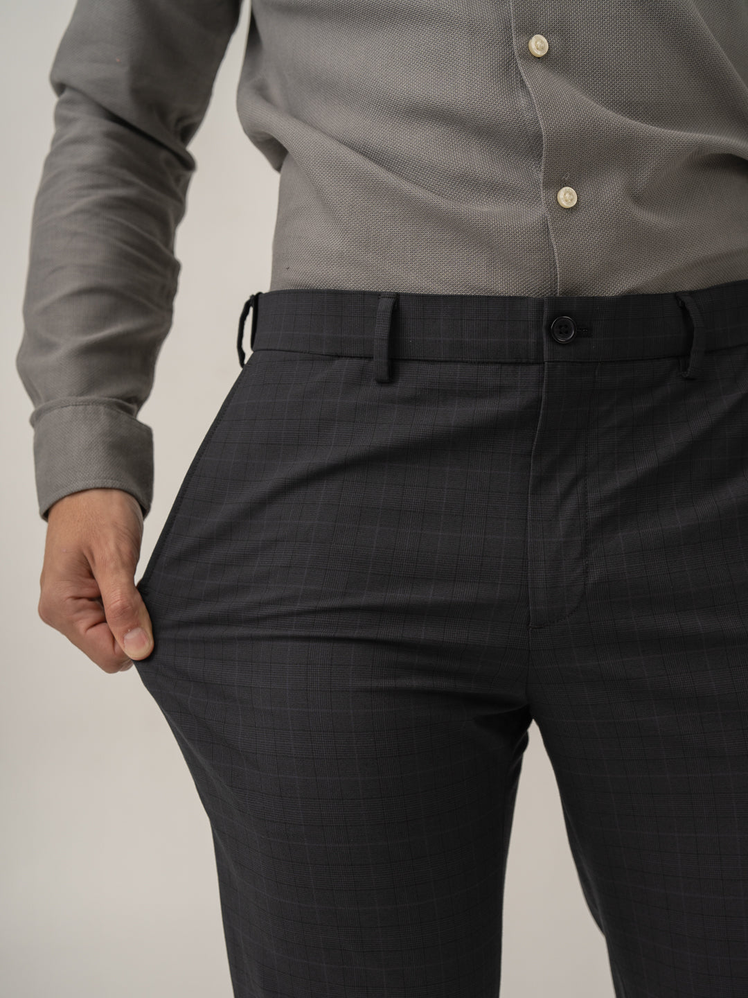 Stretch feature of submarine black checks formal pant at Pant Project