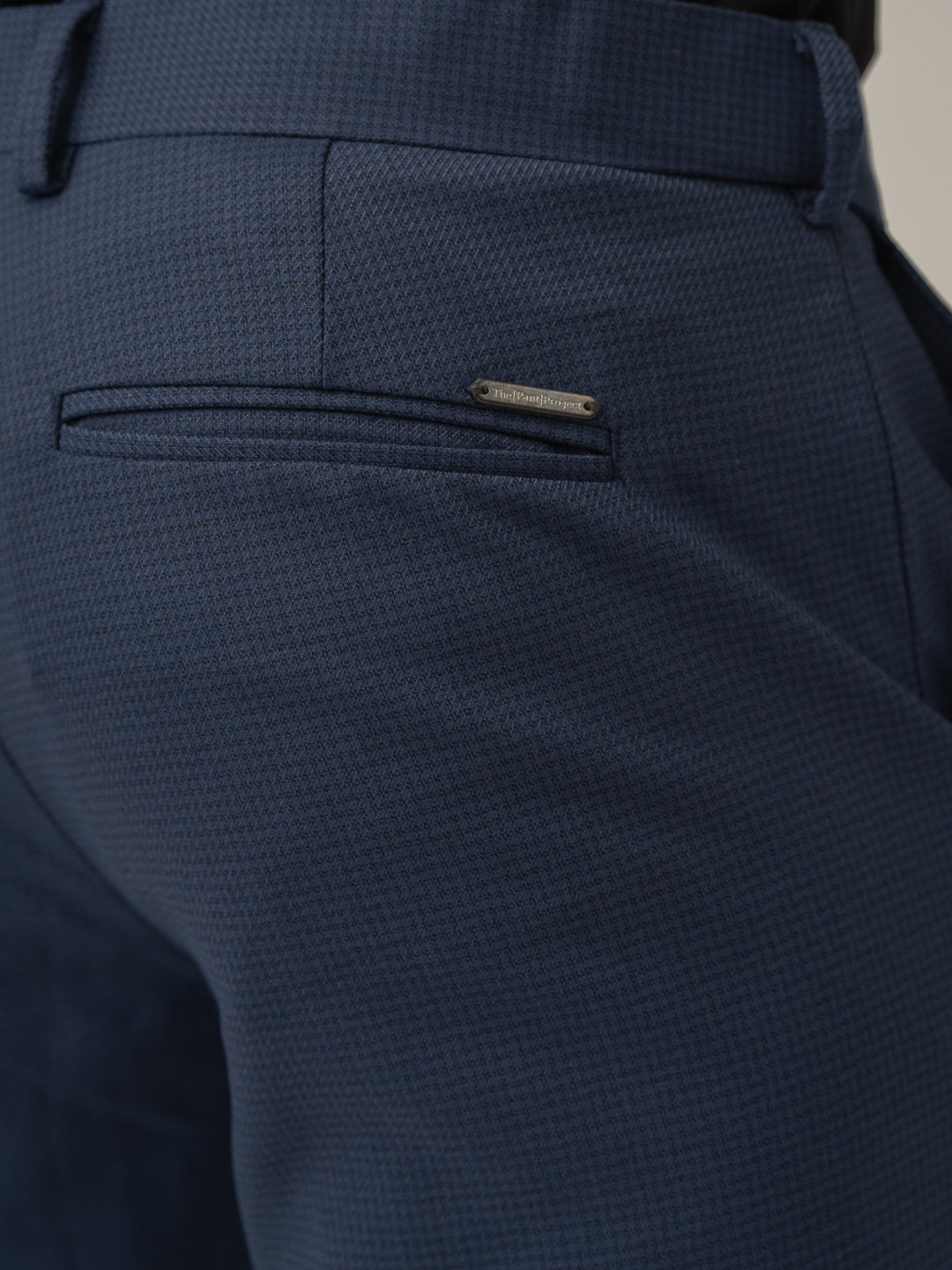 Back pocket detail of osaka navy textured formal pant at Pant Project