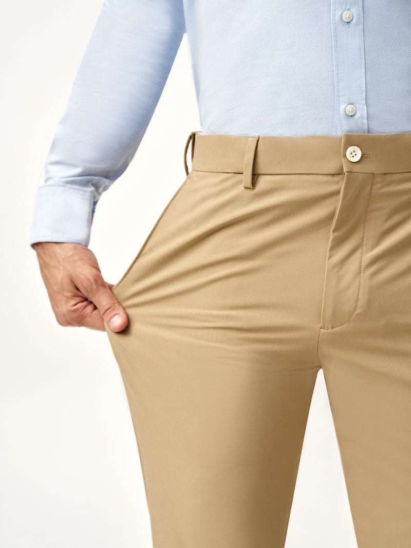 side view of Pant Project's camel stretchable trousers paired with formal shoes