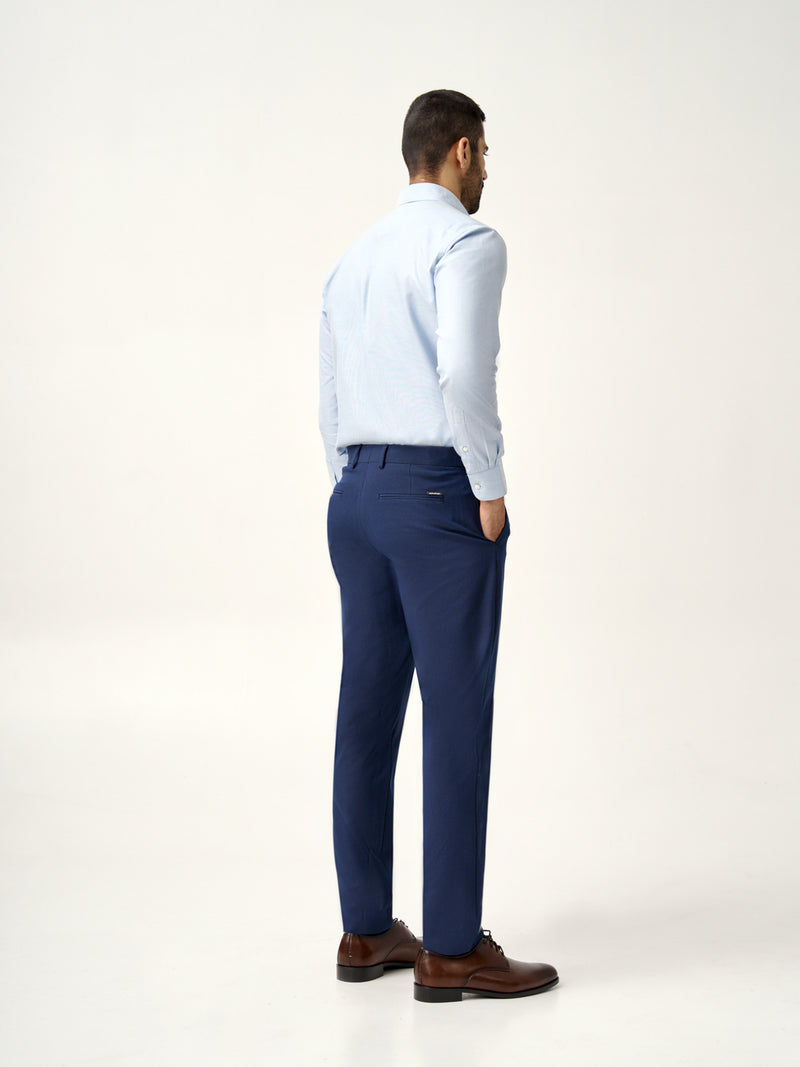 back view of Pant Project eco navy trousers with branding detail