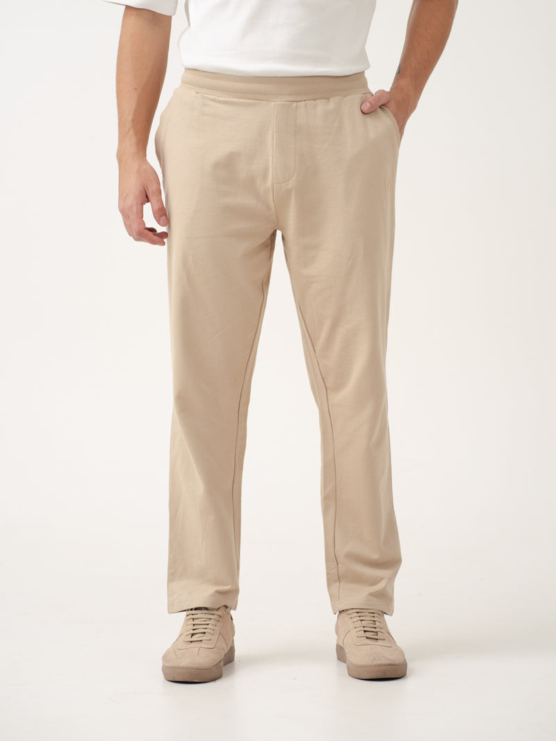 front view of nomad beige sweatpant by pant project featuring relaxed fit