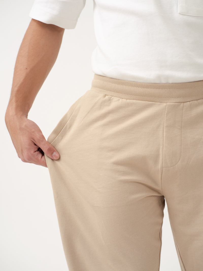 close-up front view of nomad beige sweatpant by pant project highlighting soft fabric