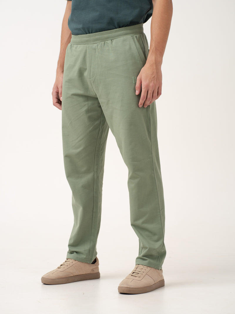 front view of sage green sweatpant by pant project featuring relaxed fit