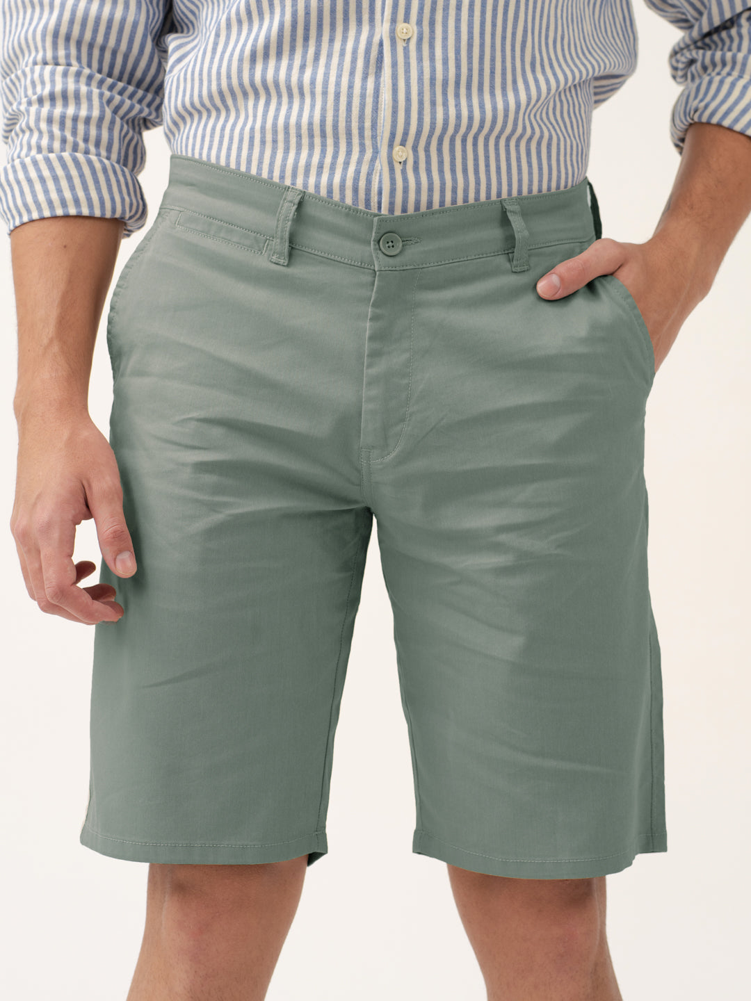 front view of green shorts by pant project with classic fit