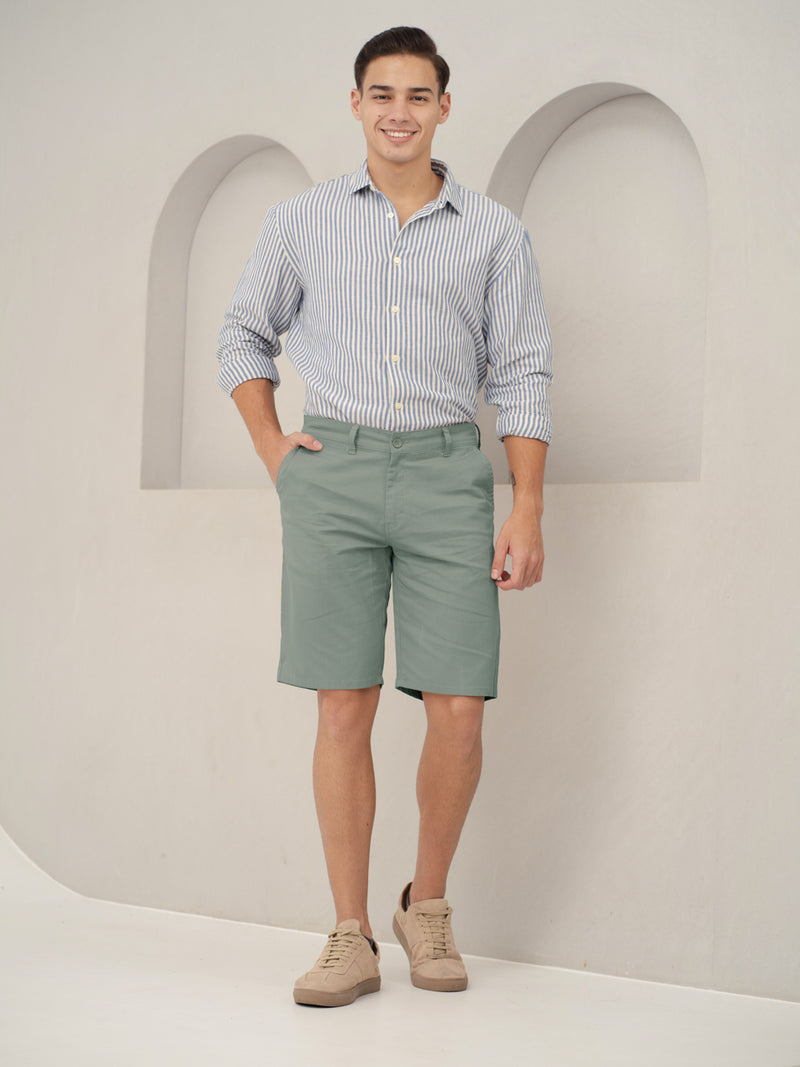 front view of green shorts by pant project with classic fit