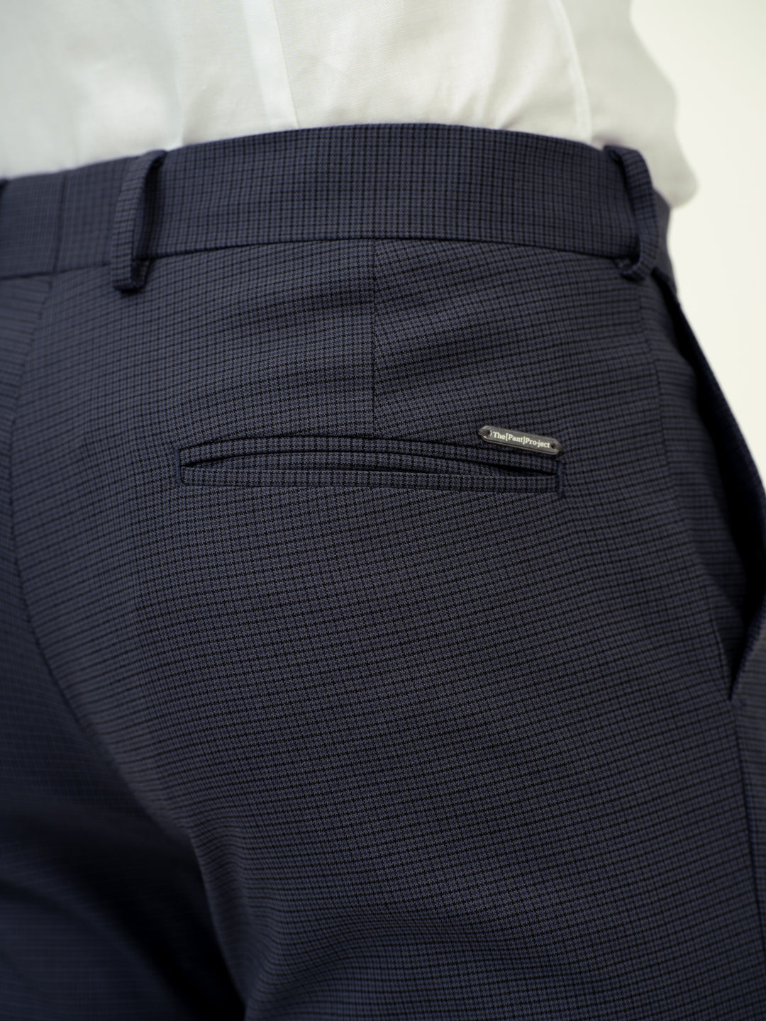 close-up back view of flint grey check pant by pant project fine texture