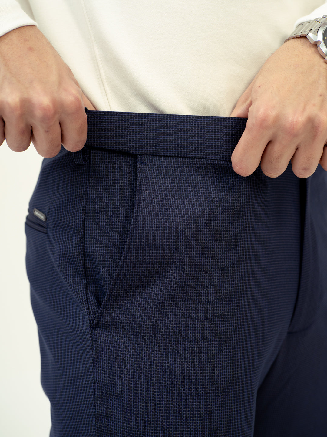 close-up side view of blue check pant by pant project showing texture