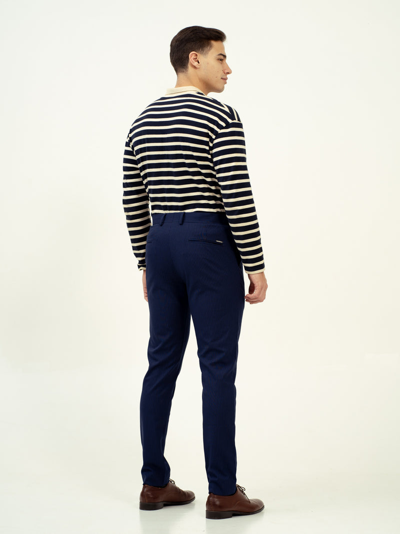 back view of navy pant by pant project with classic fit