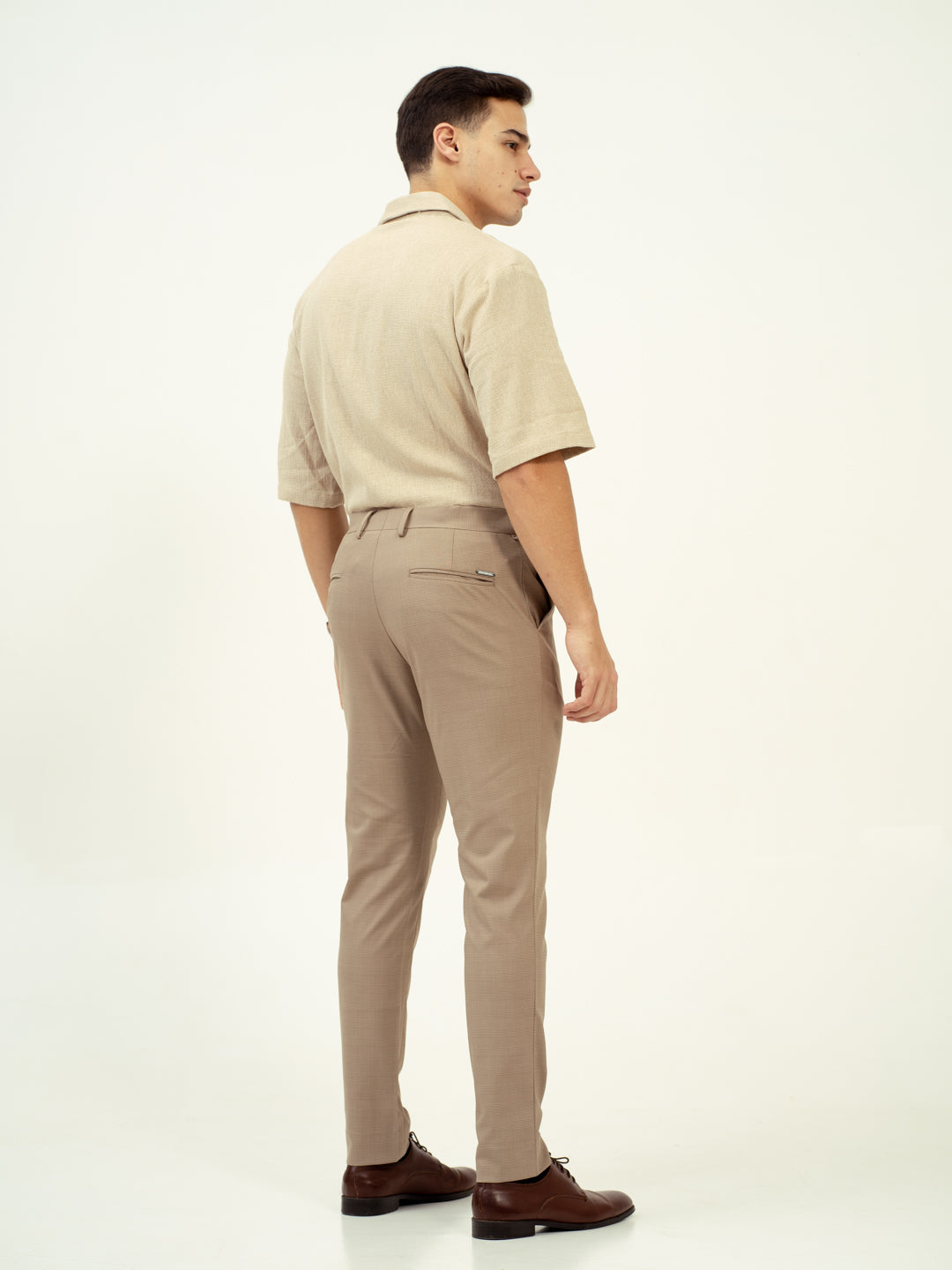 back view of tiramisu beige pant by pant project with tailored fit