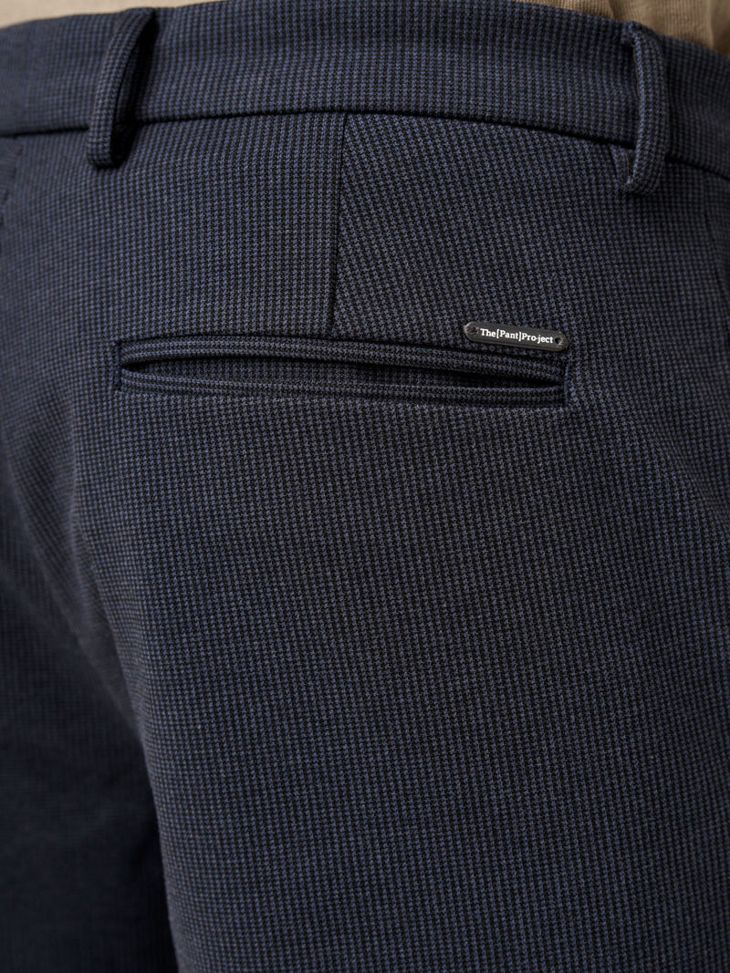 back view of storm grey pants by the Pant Project showing the logo near pocket