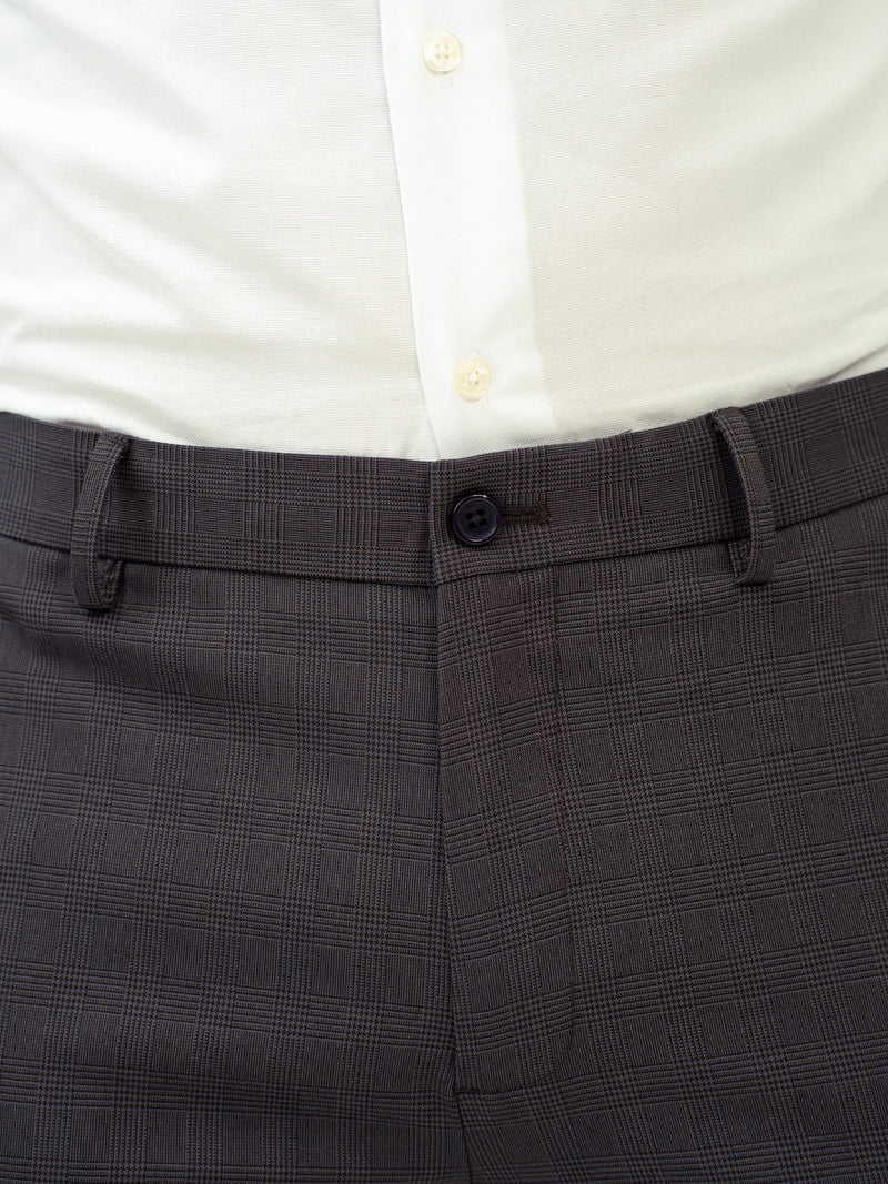 close-up view of molten grey check pants by pant project highlighting button detail