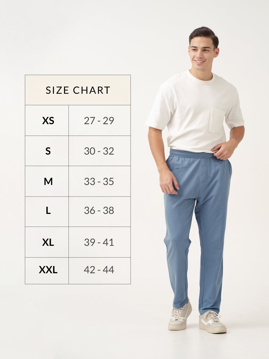 front view of pixel blue sweatpant by pant project with model and size chart