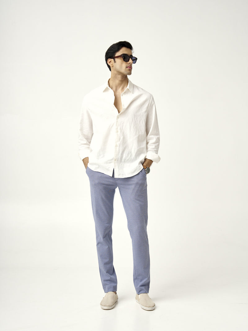 a man in a white shirt paired with scottish blue pants from the Pant Project, front view
