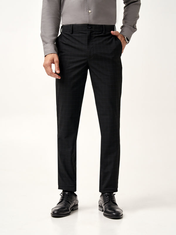 angled view with a close fit of Pant Project raven black stretchable trousers