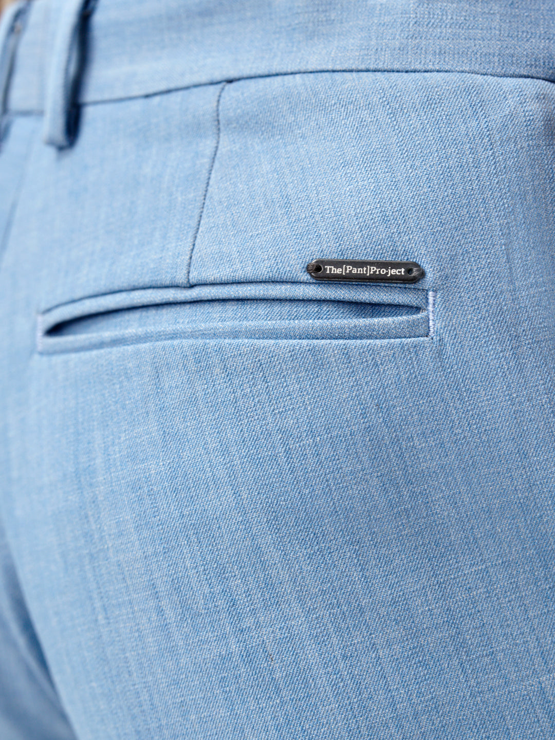back pocket detail of Pant Project's blue bali stretchable trousers