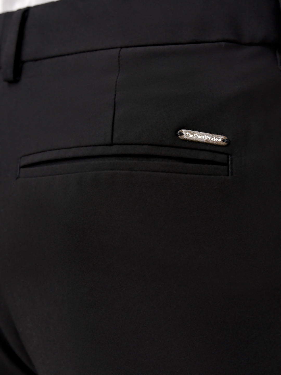 back pocket view of Pant Project's ebony black stretchable trousers