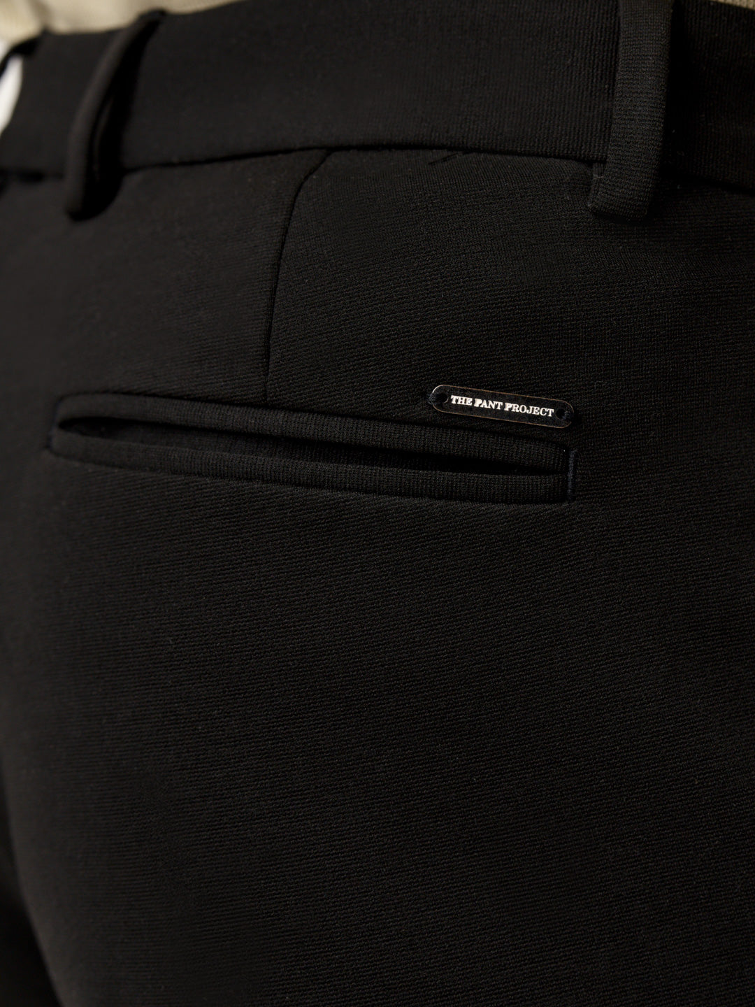 back pocket view of bangalore black pants with the Pant Project logo