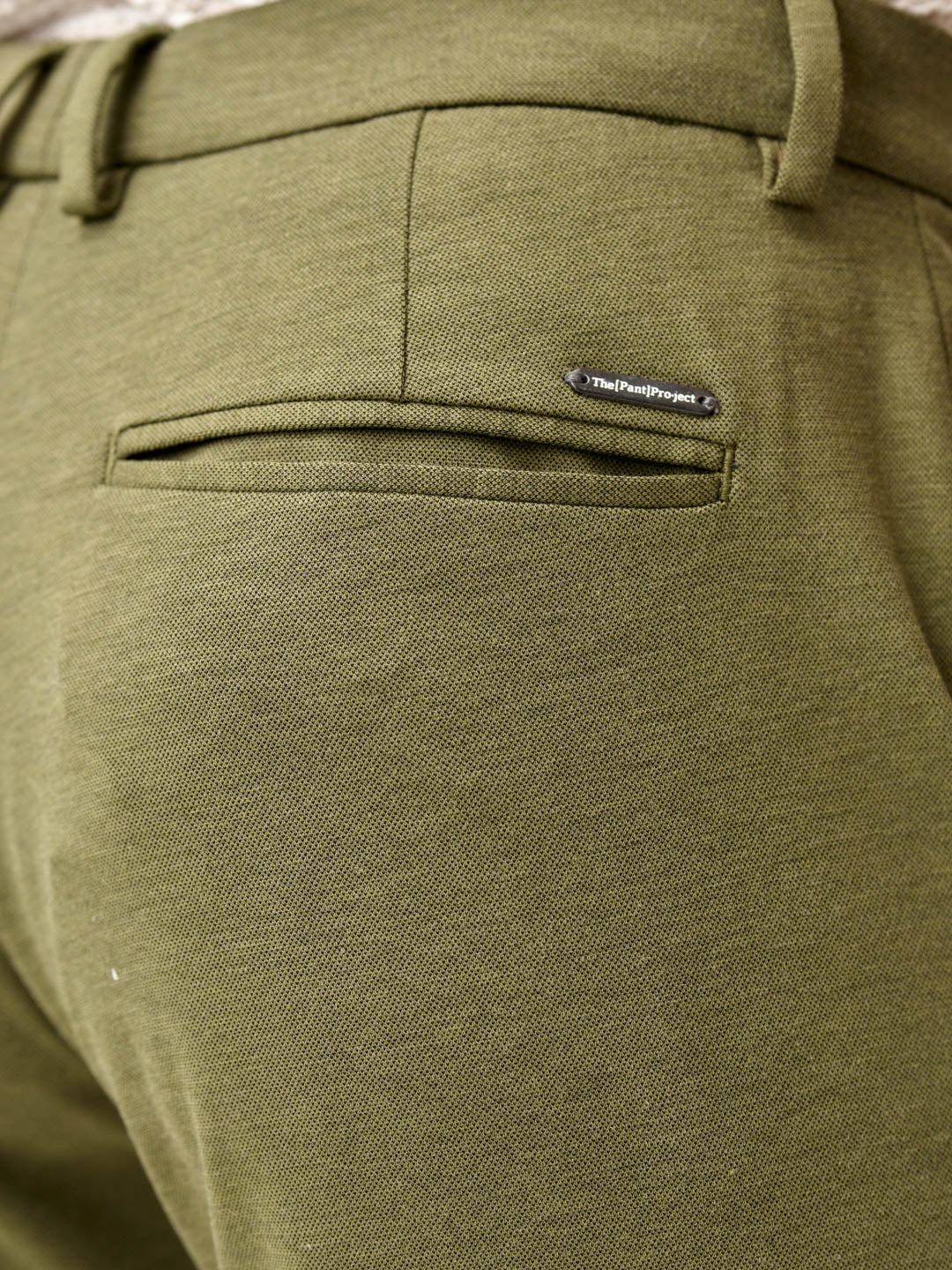 back pocket view of military green pants by the Pant Project