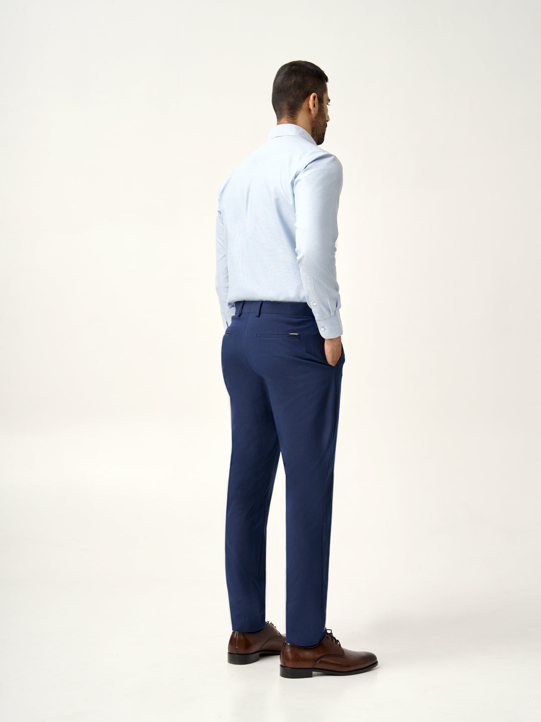 back view of Pant Project's astro navy stretchable trousers