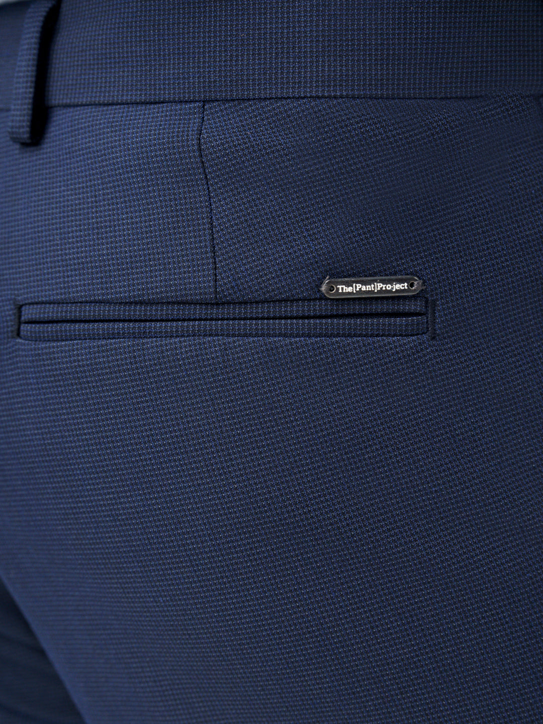 close-up of back pocket on Pant Project's astro navy stretchable trousers