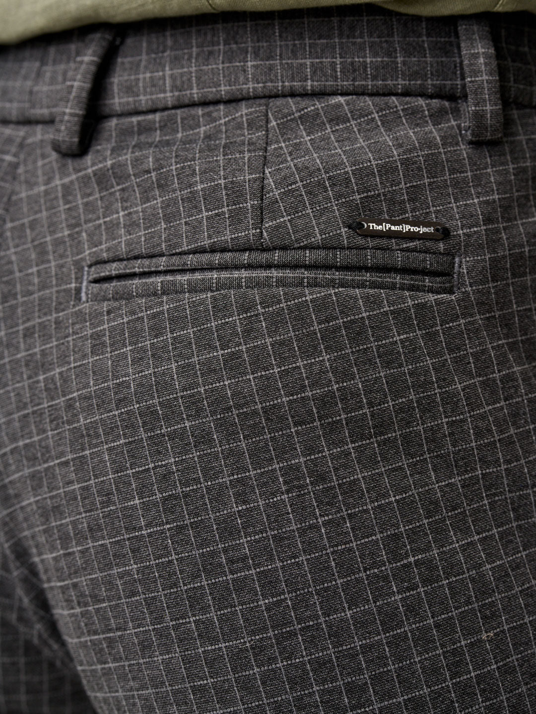 close-up of grey check pants with detailed stitching from the Pant Project