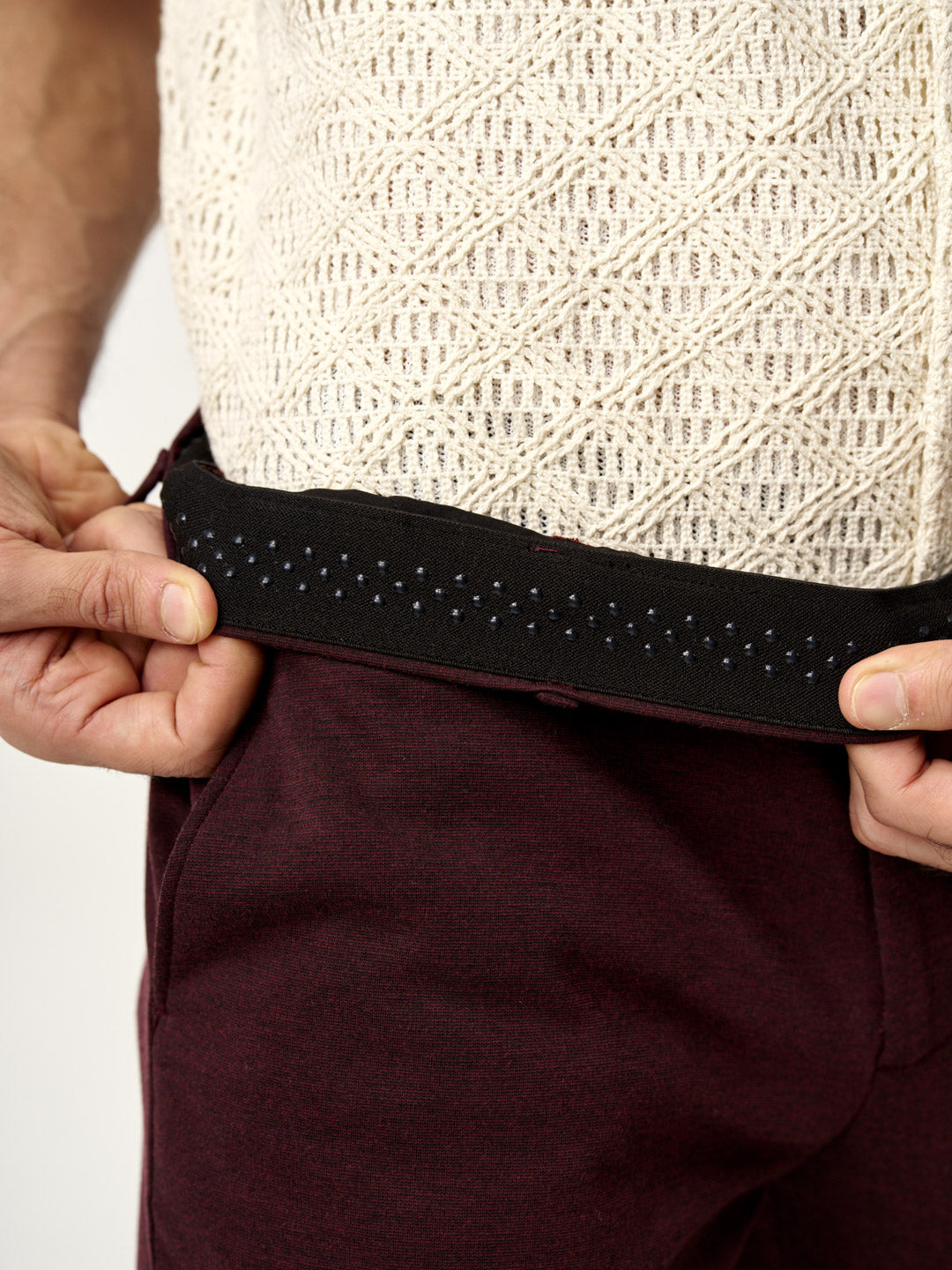 close-up of waistband with anti-slip grip inside plum wine trousers, the Pant Project
