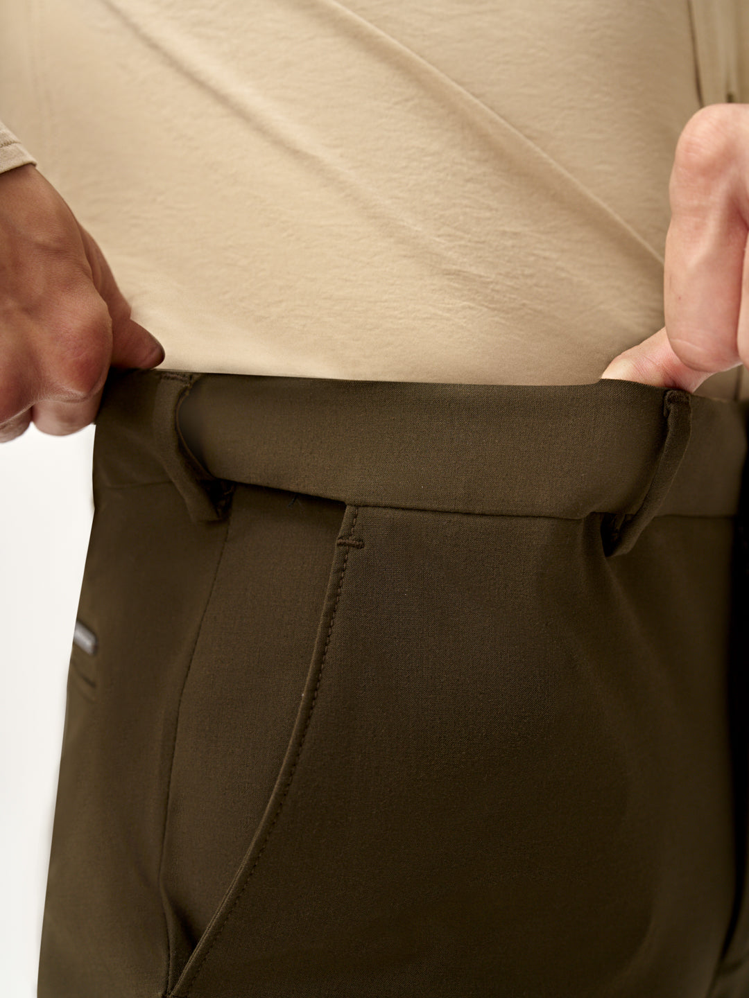  close view of waistband stretch feature on Pant Project olive green stretchable pants
