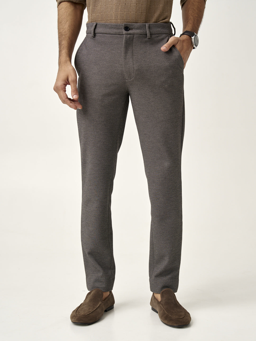 front view of granite texture pants from the Pant Project paired with brown loafers