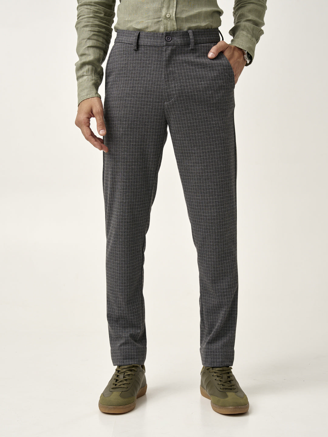 front view of grey check pants worn with a green shirt, from the Pant Project