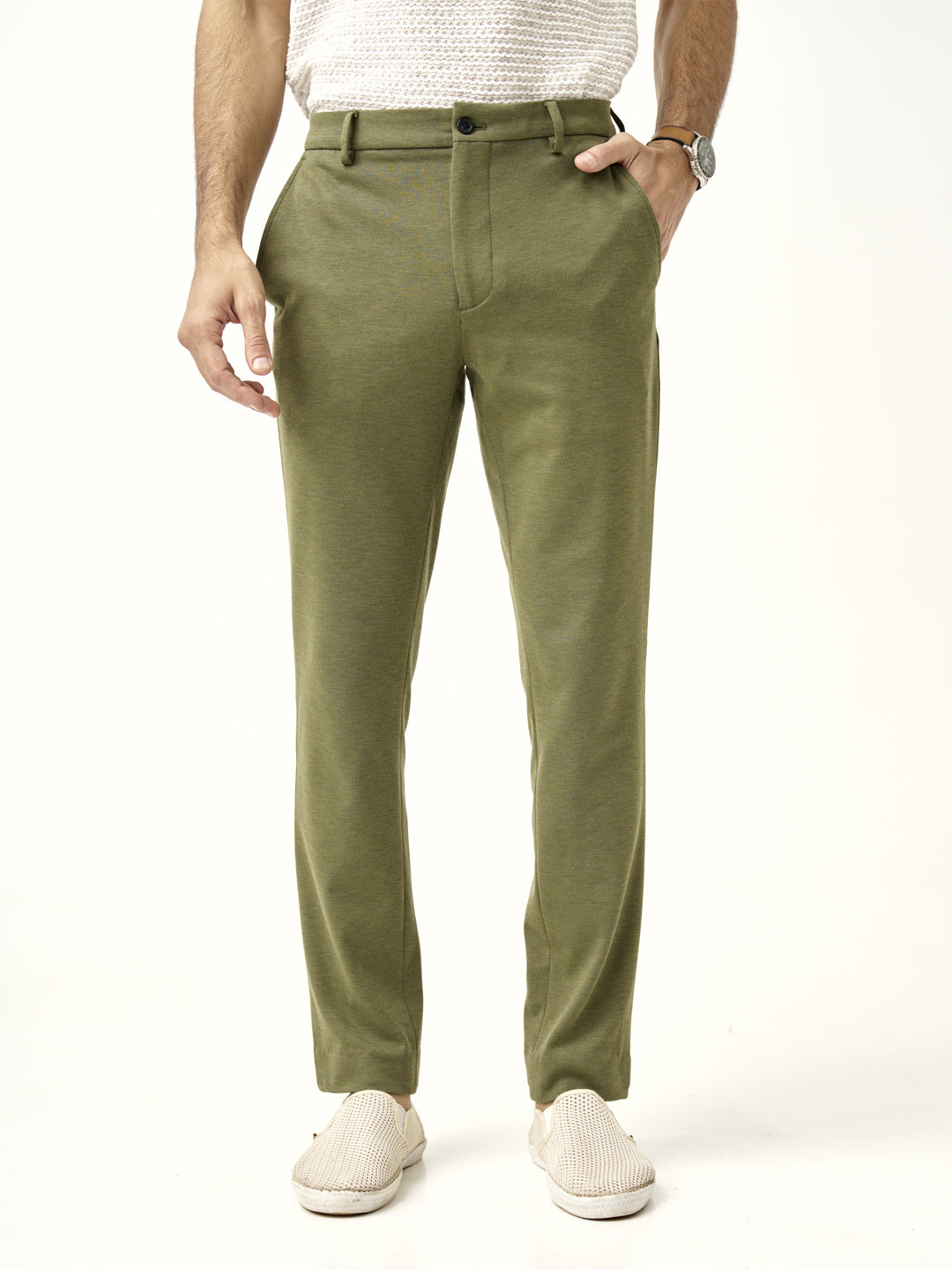 front view of military green pants paired with a textured white t-shirt by the Pant Project