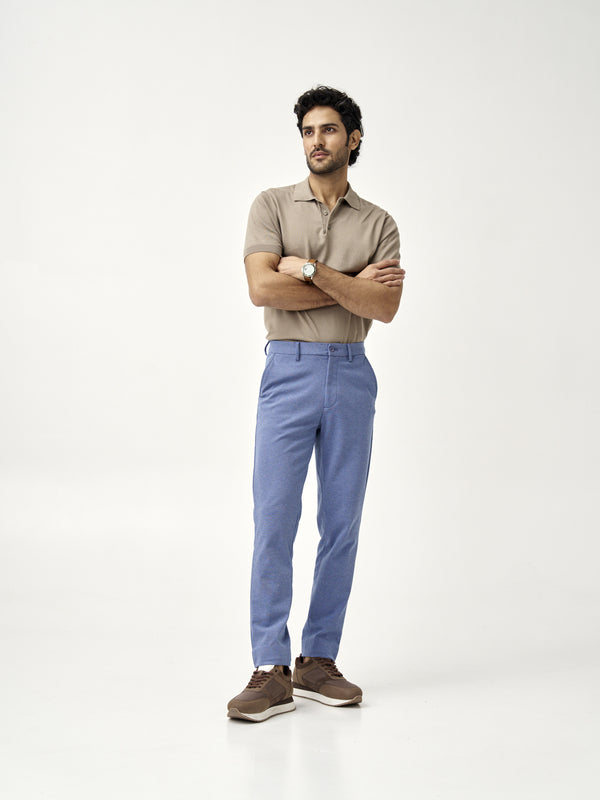 front view of ocean waves pants paired with a beige polo by the Pant Project