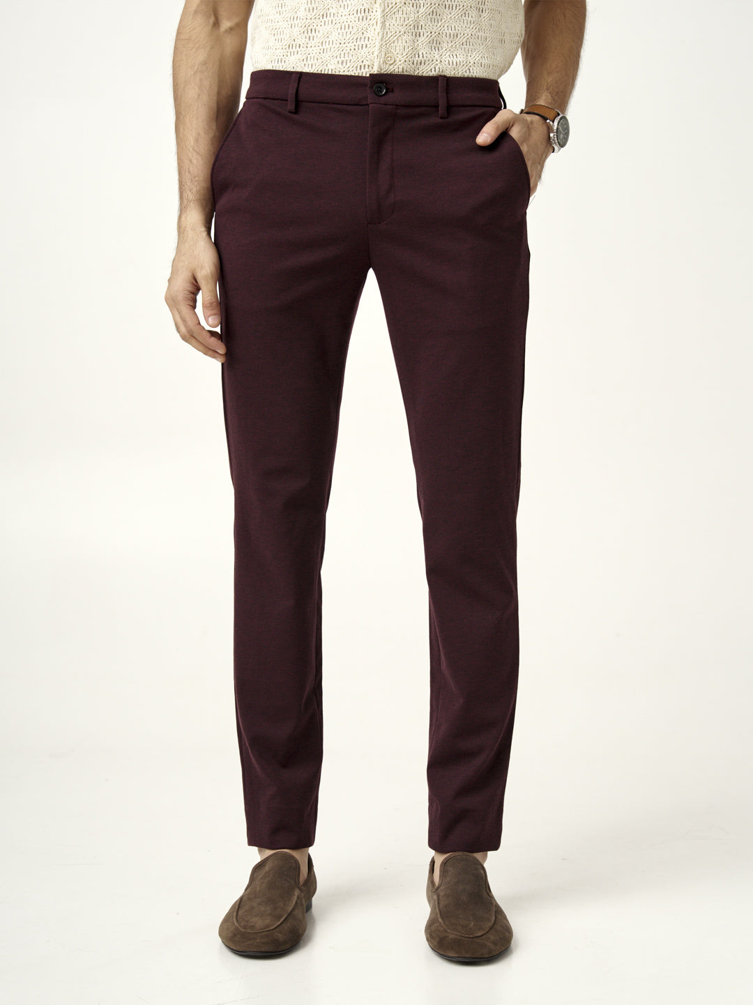 front view of plum wine trousers worn by model by the Pant Project