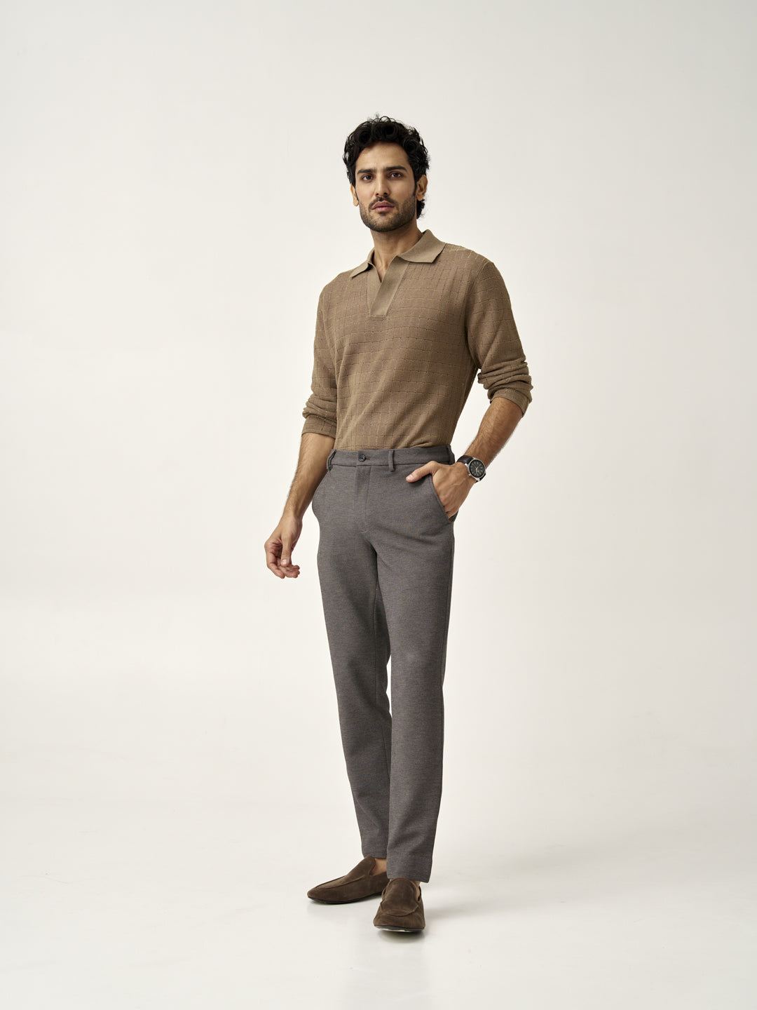 full-body view of man wearing granite texture pants from the Pant Project, hands in pockets