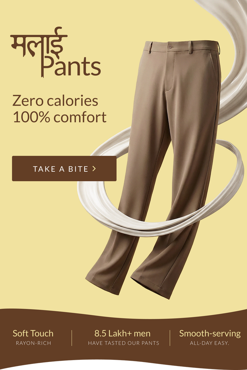 A pair of tan slim-fit pants shown on a beige promotional background with decorative white curved swirls, Hindi marketing text, and a brown banner at the bottom.