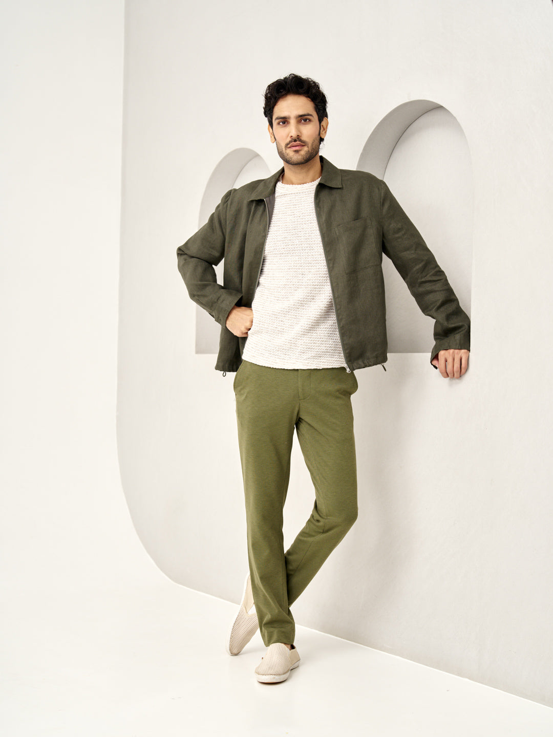 man wearing military green custom pants with a casual olive jacket, the Pant Project