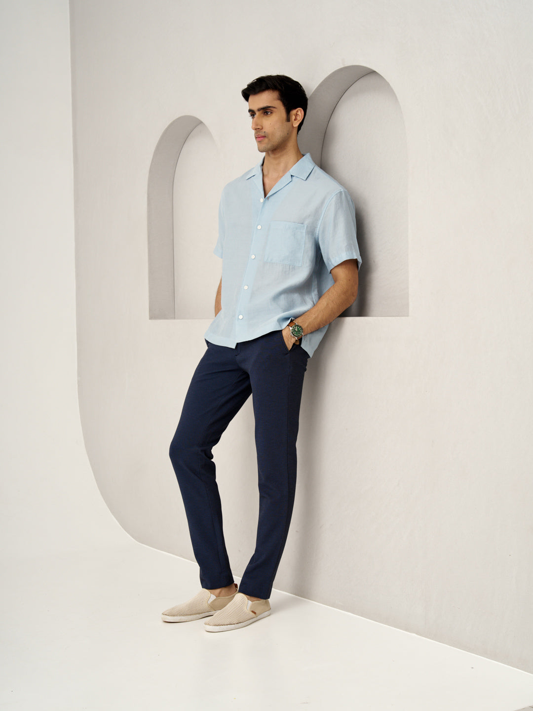 man wearing sail blue custom pants from the Pant Project paired with a light blue shirt