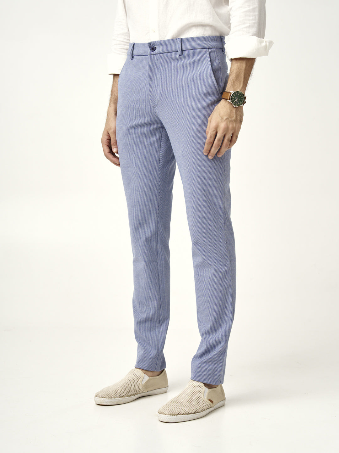 man wearing slim-fit scottish blue pants from the Pant Project with beige loafers