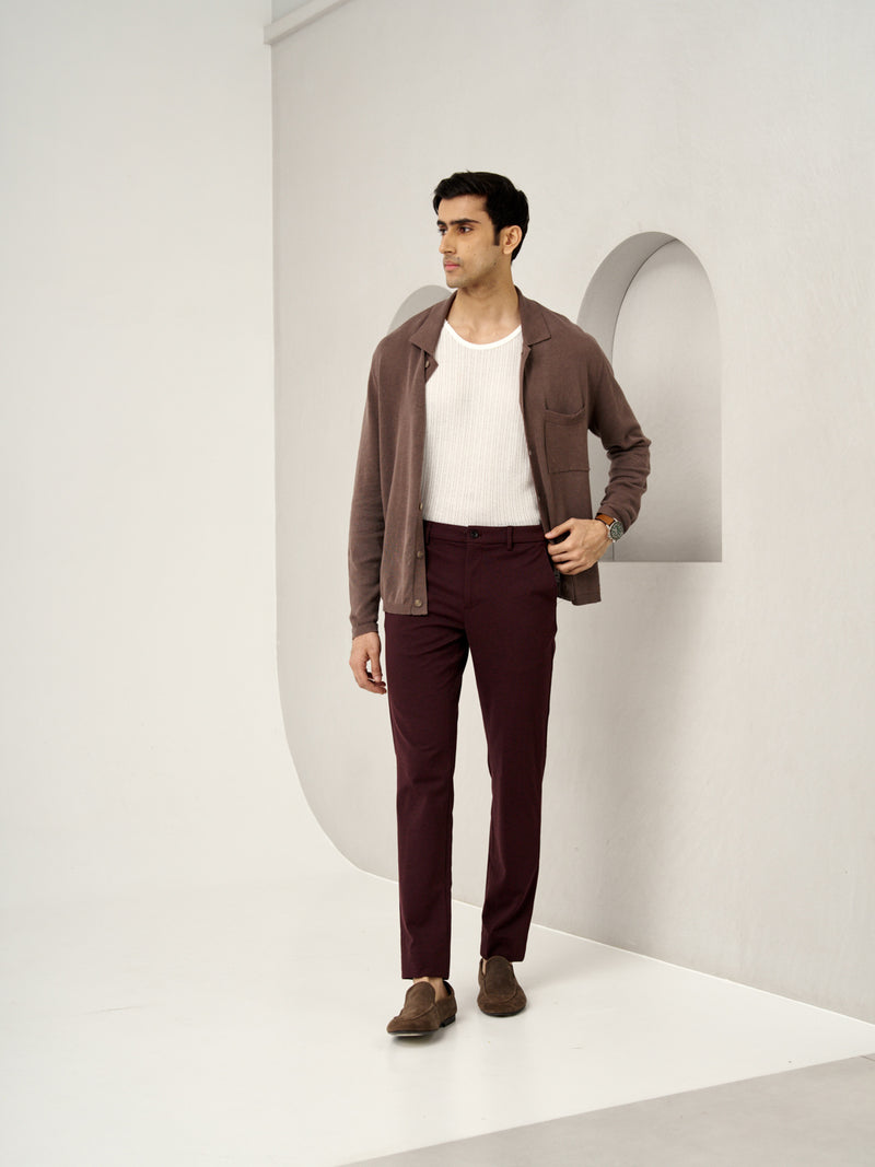 model standing in a casual look wearing plum wine trousers by the Pant Project