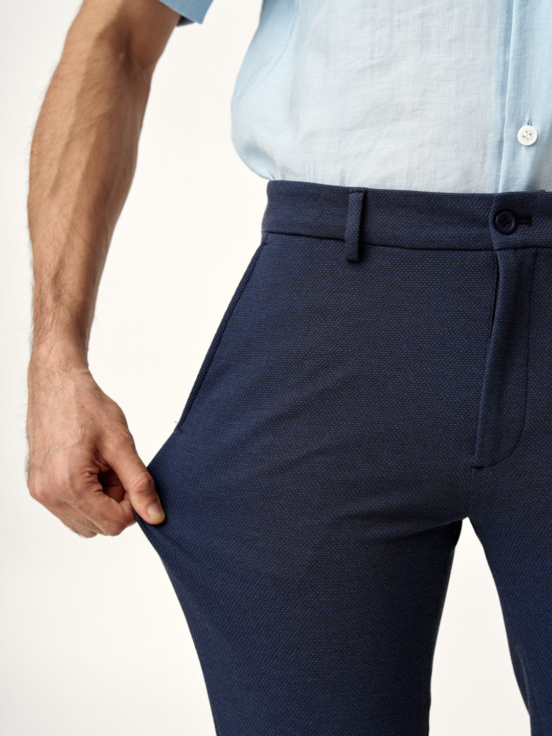 showing the stretch of sail blue custom pants from the Pant Project