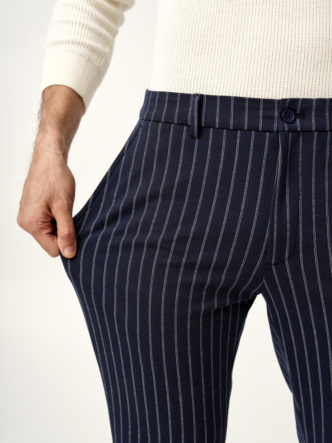 stretchable blue pinstripe pants by the Pant Project showing pocket details