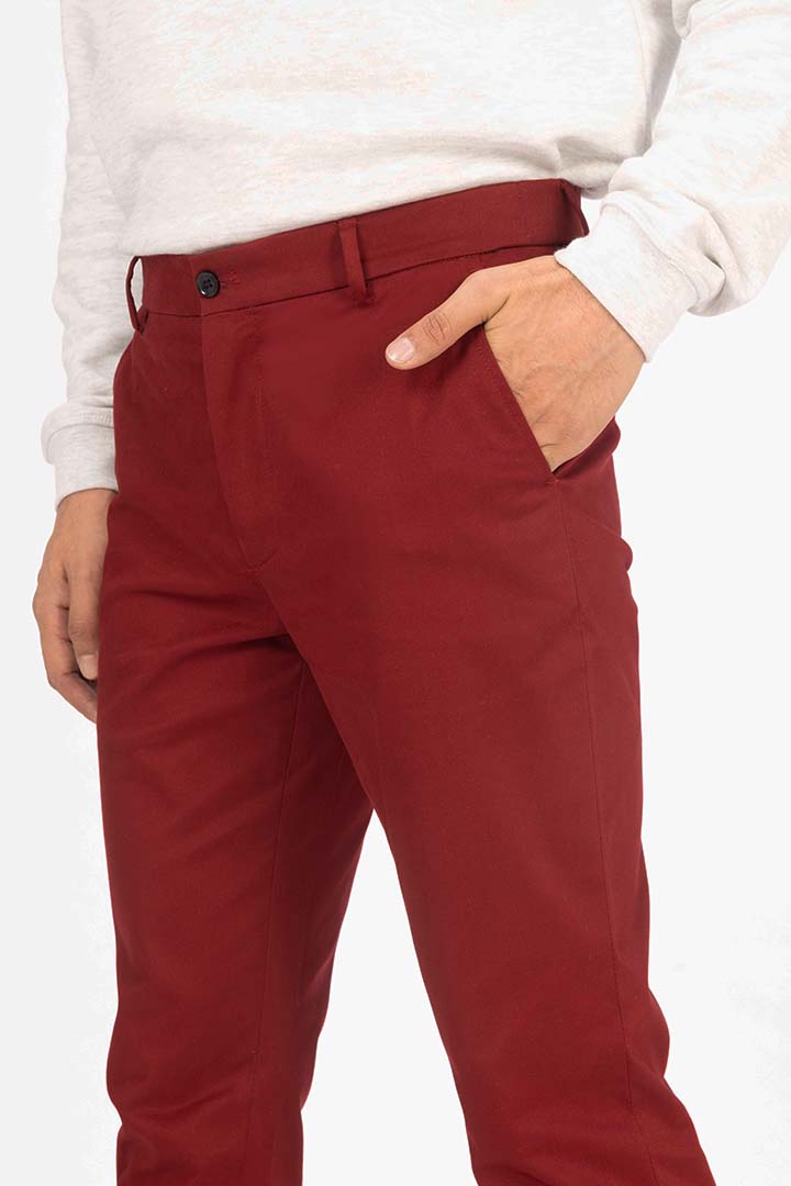 front view of red chino by pant project featuring sleek design