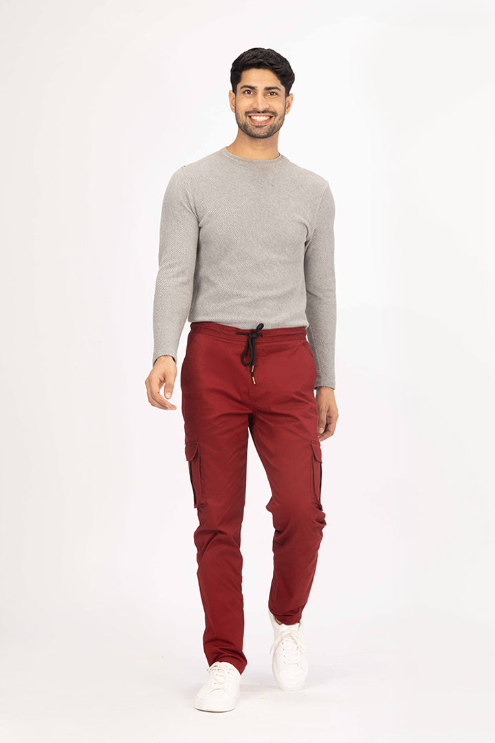 front view of red cargo pants by pant project with casual fit