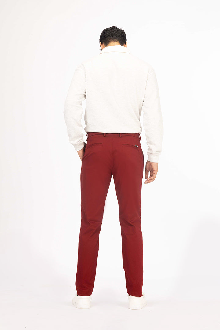 back view of red chino by pant project showcasing tailored fit