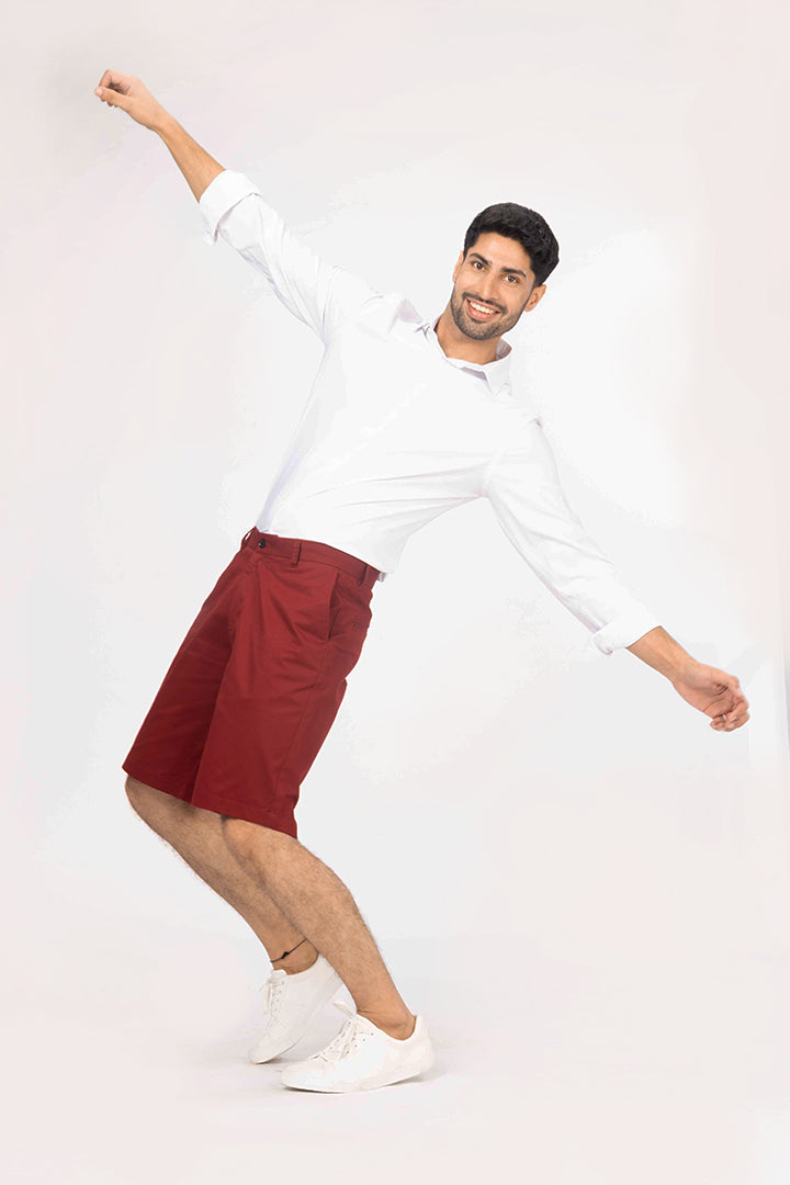 front view of men's red chino shorts by pant project in vibrant red