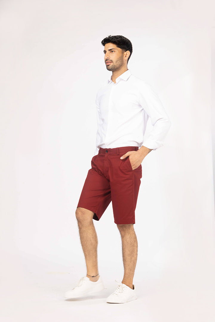 side view of slim-fit red chino shorts by pant project in stylish red